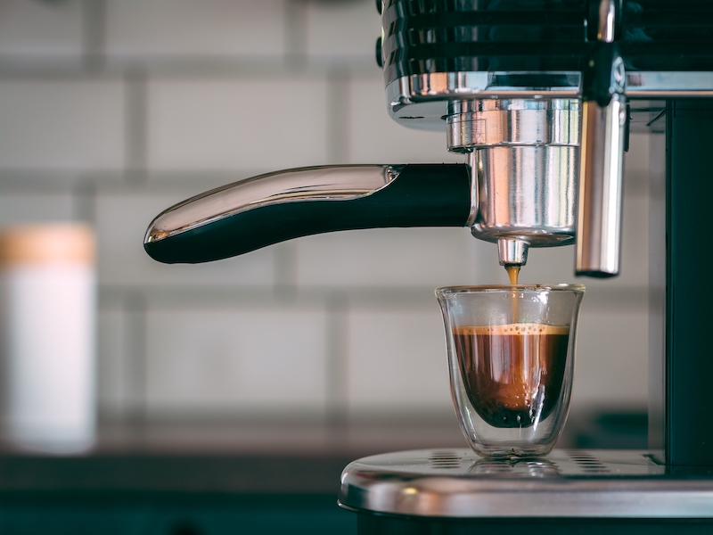 selective focus shot espresso machine making tasty warm coffee morning